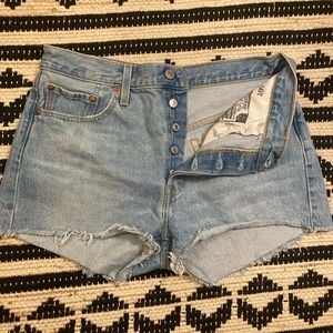 Levi’s 501 high-rise light wash denim shorts
